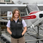 Kenmore Air Flight Instructor Ava Karr and a Piper SuperCub