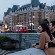 Couple outside the fairmont Empress. Photo by Destination BC and Jordan Dyck